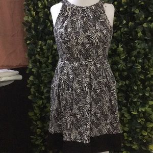 Sleeveless black print dress